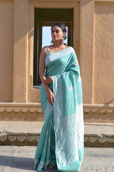 Turquoise Tussar Silk Banarasi Saree With Silver Motifs Manufacturers in Varanasi